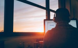 man at computer working