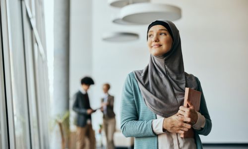 woman holding book